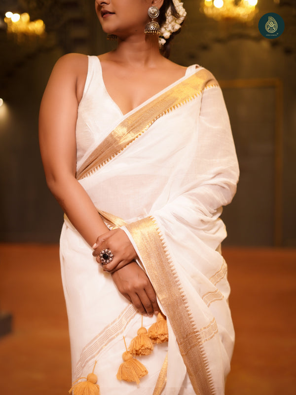 Coco White Thiruvonam Mul Cotton Solid Saree